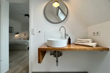 Badezimmer-Michels-Apartments-Guetersloh Modernes Bad im Apartment bei Michels in Gütersloh